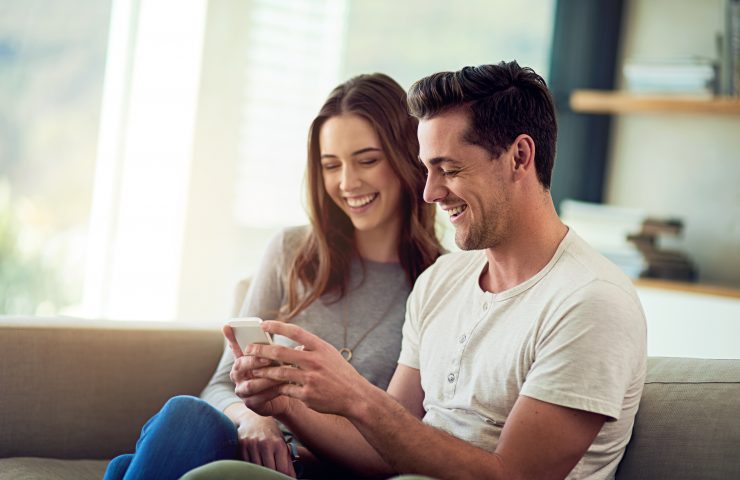 sharing-is-caring-shot-of-a-happy-young-couple-us-2022-12-14-23-18-56-utc