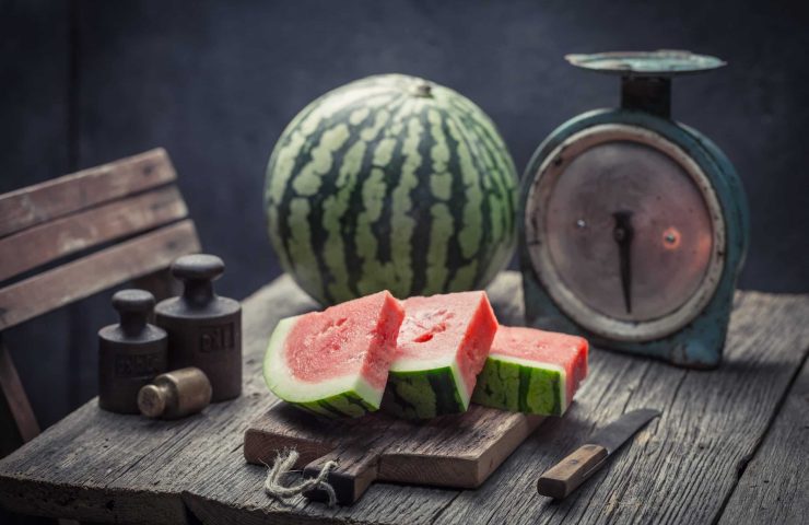 Delicious watermelon on an old wooden table